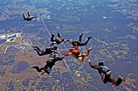 Skydivers building a formation