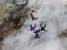 Skydivers Doing Sequential Relative Work